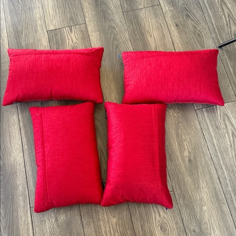 4 SAFAVIEH Beautiful Beaded toss pillows in a rich jewel tone red